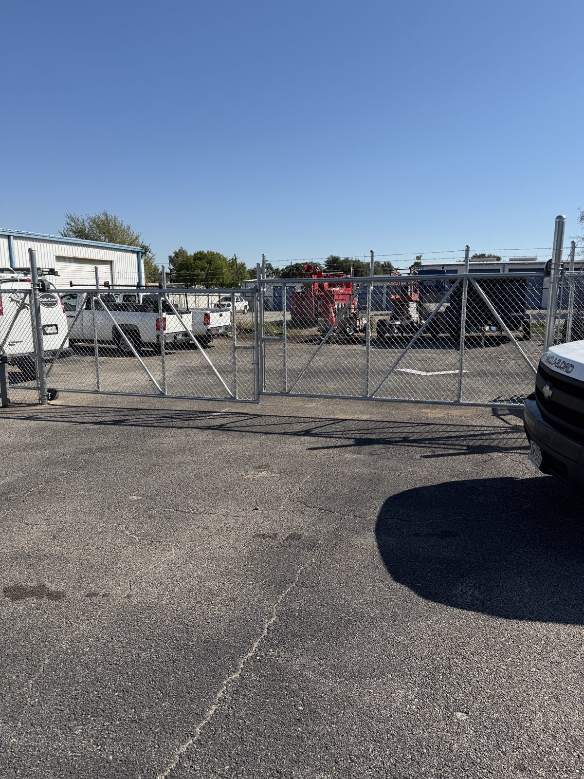 Chain link double drive gate at a commercial property
